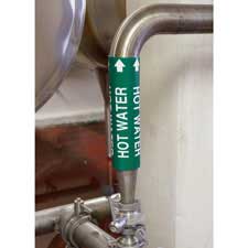 A pipe with a green Brady snap-on pipe marker reading "Hot Water" applied to it.